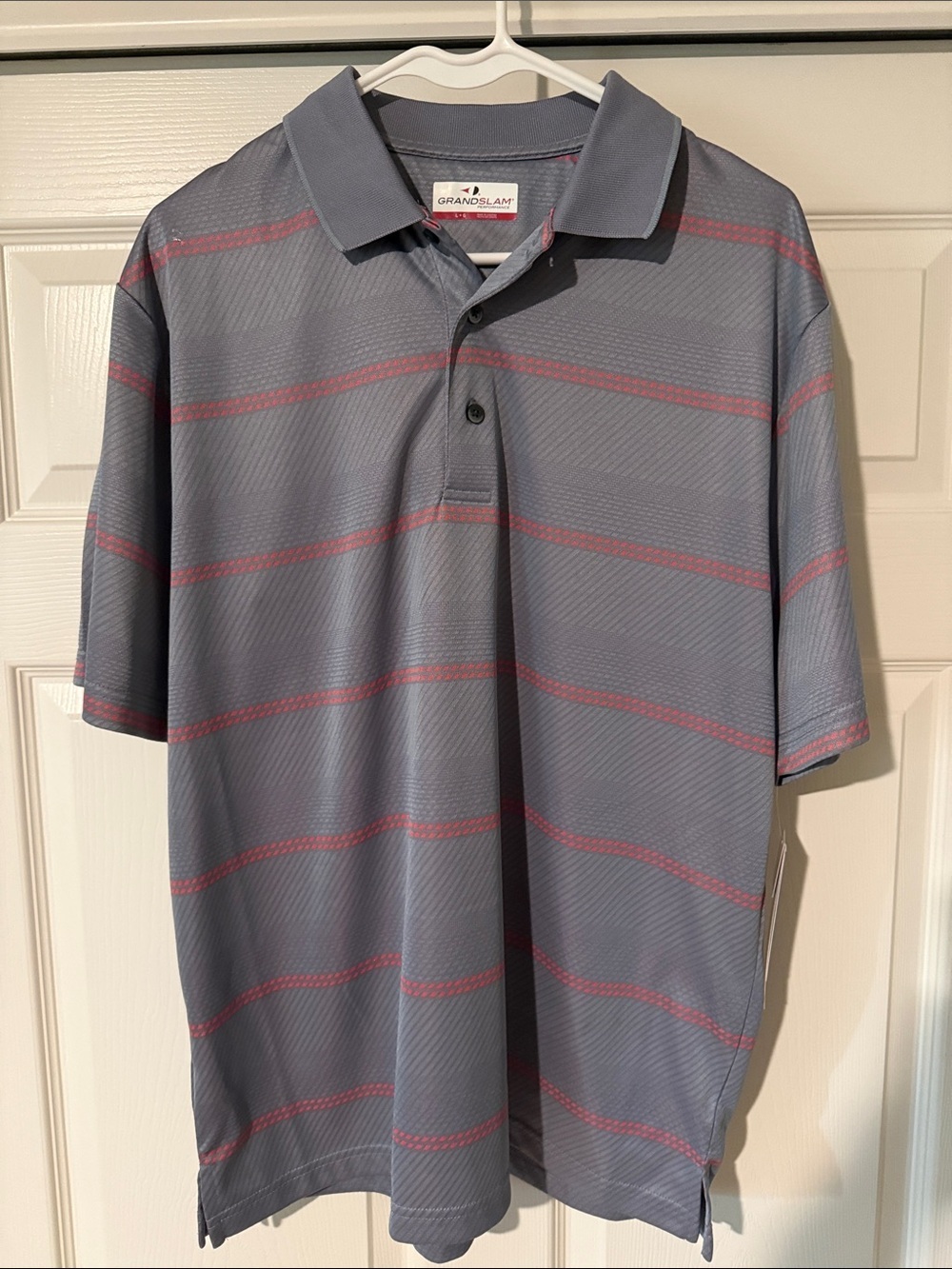 Grand Slam Gray Polo with Dotted Orange Stripe Accents